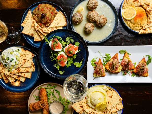 A table laid with Greca's meze.